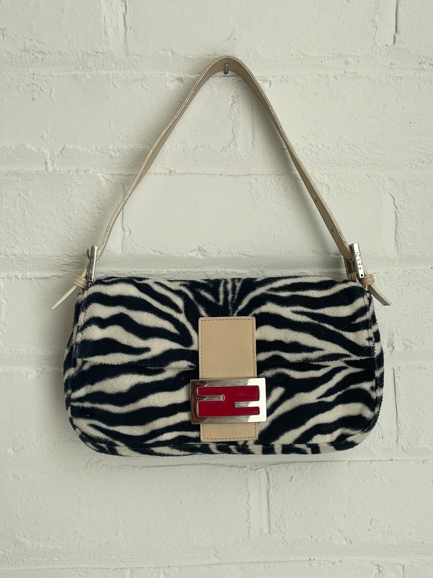 Fendi Zebra Print Baguette with Contrasting Red Buckle